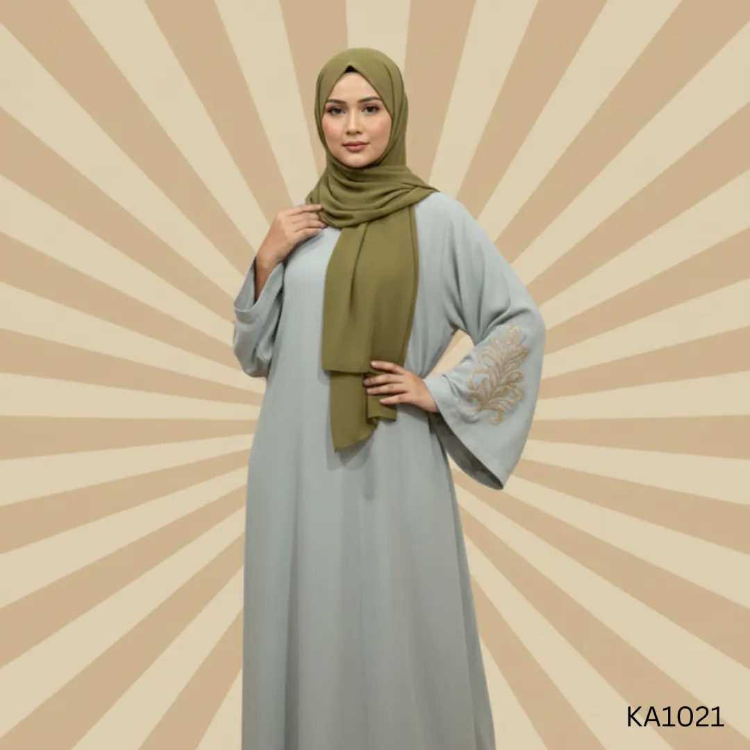 Double-shaded baggy style abaya featuring beautifully embroidered sleeves ,blending comfort with sophisticated detailings.